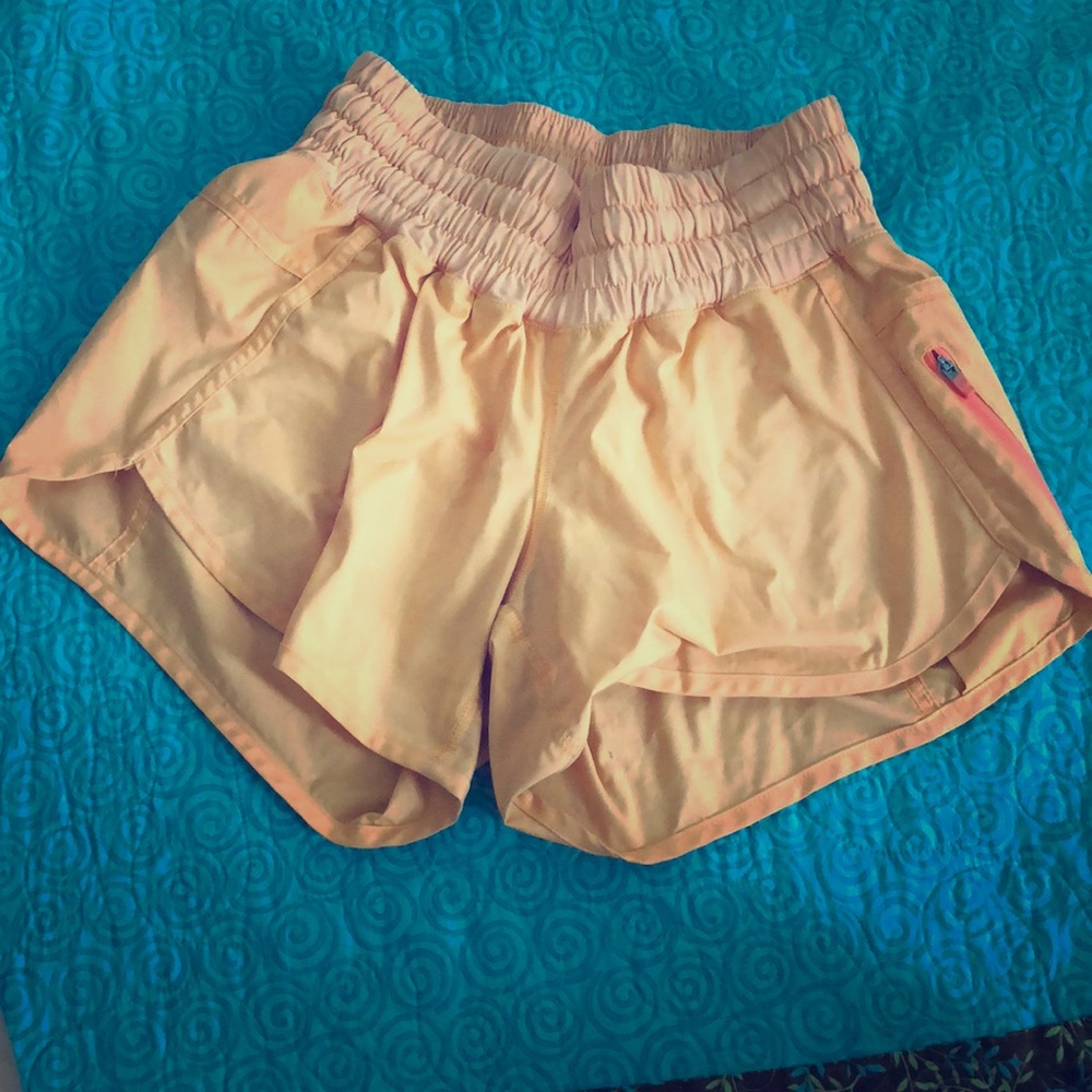 Lululemon orange running shorts - size 4